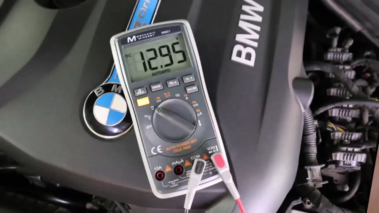 Mechanic Mindset multimeter testing on an engine